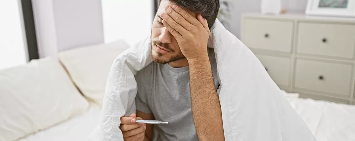 Febra, simptom comun pentru hantavirus si Covid-19.