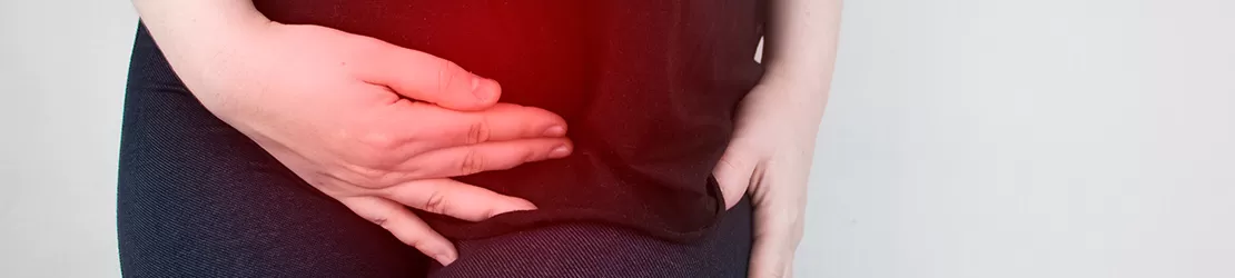 Femeie cu durere provocata de o sarcina molara