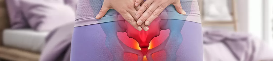 femeie cu durere de coccis
