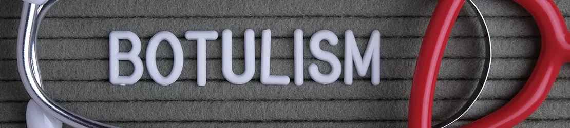 Stetoscop aranjat in jurul unor litere care formeaza cuvantul „botulism”